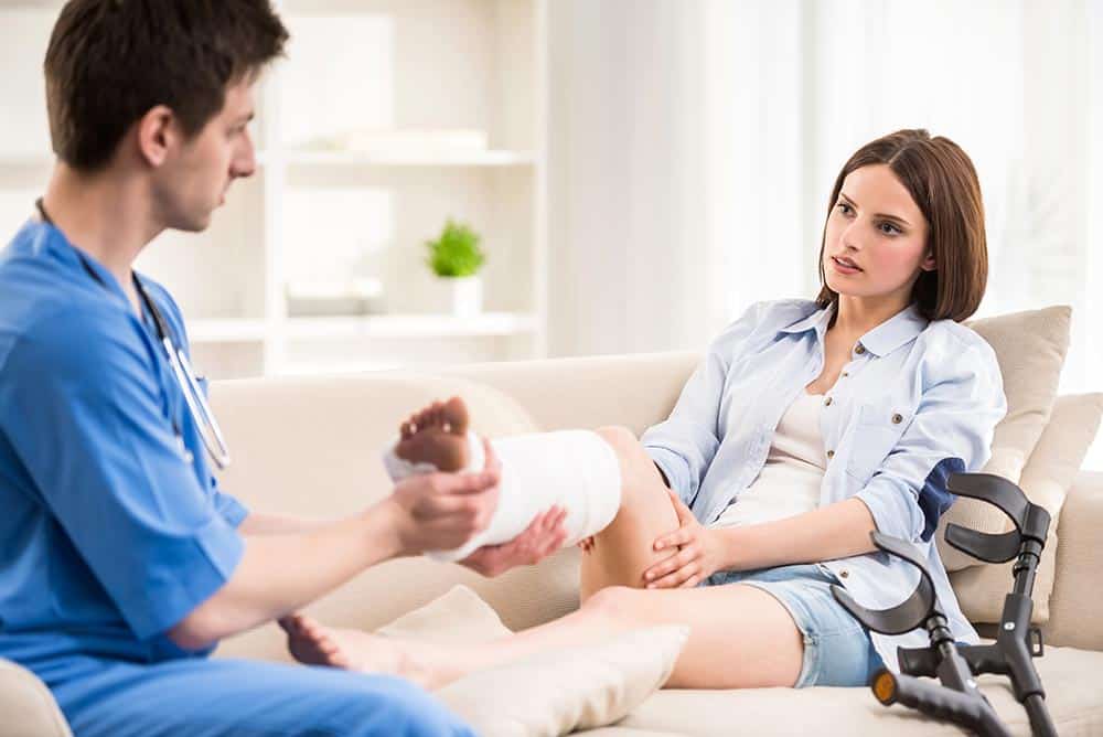 Doctor Caring for a Patient's Leg