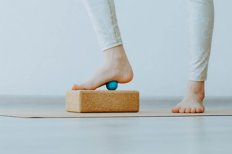 Person doing physical therapy for plantar fasciitis